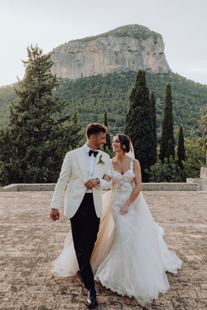 Groom in White Tuxedo |  Andrea Kosta